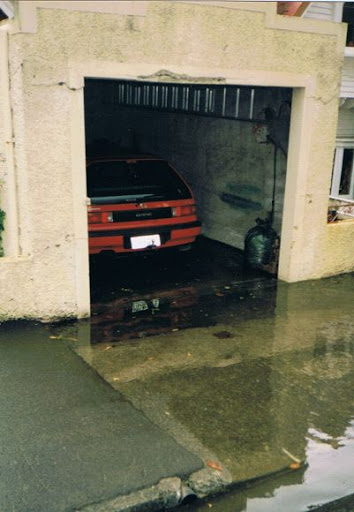 sensible repairs to garage on frontage - broken lintel, new floor to improve levels/prevent flooding